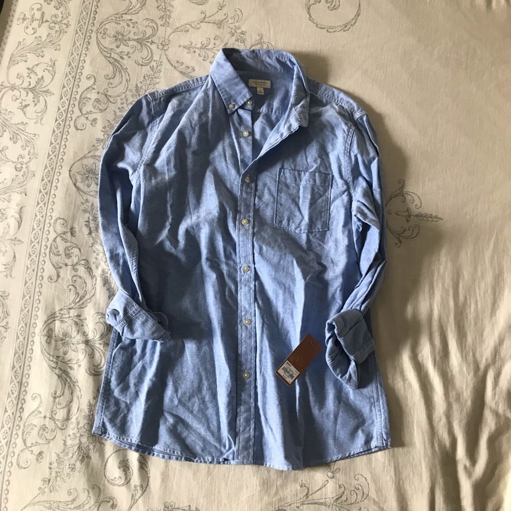 Blue button up collared shirt